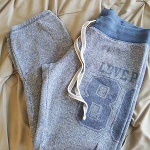 PINK cinch-crop sweatpants.